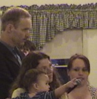 Jessica talked about how God has saved and healed her children as Terri Palmquist held Matthew, Jessica's son saved from abortion.