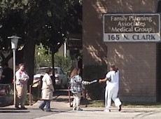 Woman entering Fresno FPA abortion chamber receives life-affirming information from LSM volunteers