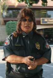 R. Perez, FPA guard, threatening to spray an 18-year-old girl with pepper spray